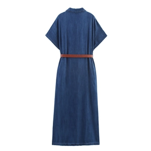 Back view of a blue denim maxi dress with short sleeves and a brown leather belt