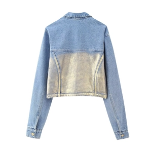 Women's cropped blue denim jacket featuring a distinct metallic gold back panel detail