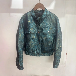 Green sequined puffer jacket with jacquard texture and metallic finish in short cut