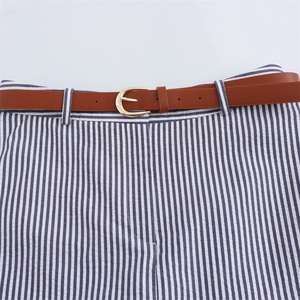 Detail view of blue and white striped pants featuring a brown PU belt with golden buckle