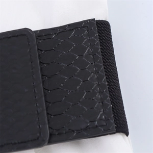 Detailed close-up showing snake skin texture and elastic band on the waist belt