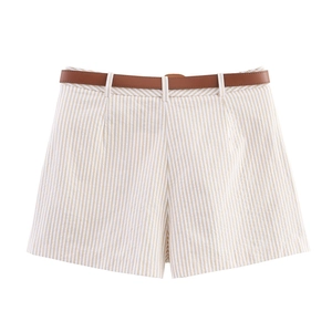Detail of high-waisted striped shorts with a brown faux leather belt on a white background