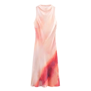 Close-up of vibrant tie-dye satin midi dress neckline with size S label detail