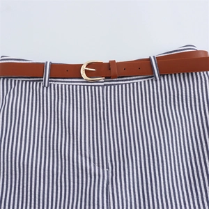 Blue and white striped trousers with a brown leather belt and golden metal buckle