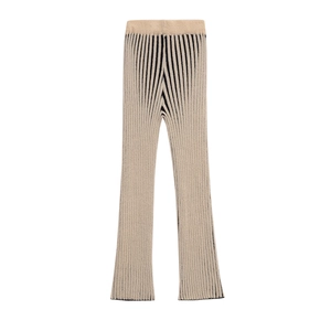 Detailed view of beige ribbed knit flare pants with black vertical stripe patterns