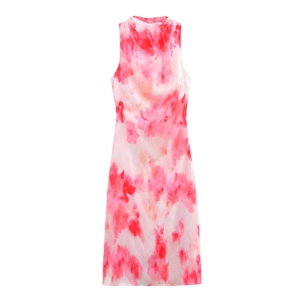Close-up of sleeveless midi dress featuring artistic pink and red gradient watercolor print