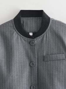 Close-up of gray pinstripe jacket with ribbed collar, buttons and size S label