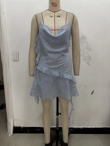 Detail view of light blue sequined mini dress with cowl neck and ruffle hem on mannequin