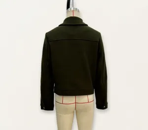 Rear view of dark green short wool jacket with zipper detail and lapel collar