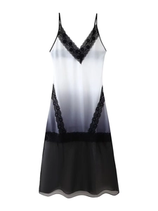 Detail of V-neck lace trim and grey gradient satin fabric on women's slip nightgown