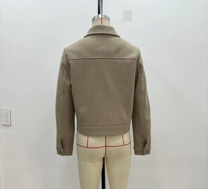 Back view of a beige short wool jacket featuring a lapel collar and horizontal yoke detail
