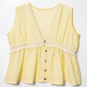 Elegant pale yellow sleeveless V-neck top with white lace trim and babydoll hem detailing