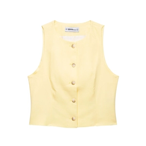 Close-up of sleeveless vest label and textured yellow cotton linen fabric detail