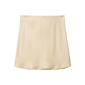 Detail view showing smooth champagne satin fabric texture and A-line hem of the skirt