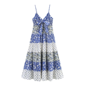 Blue and white floral patchwork tiered maxi dress with V-neck and front bow detail