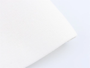 Gros plan sur la texture du tissu en tricot blanc avec maille fine et douce