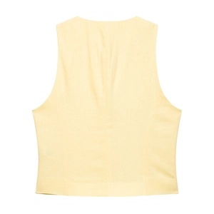 Pale yellow sleeveless vest with tailored back seams and premium cotton linen texture