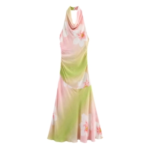 Close-up of floral print halter dress showing side ruching detail and satin fabric