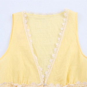 Pale yellow sleeveless V-neck top for women with delicate white lace trim and button detail