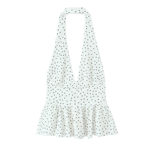 Haut blanc à pois de style français avec col en V licou et ourlet à volants pour l'été