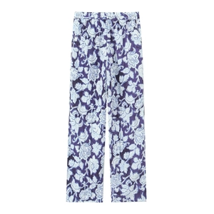 Dettaglio di pantaloni con stampa paisley floreale e coulisse regolabile in vita elastica