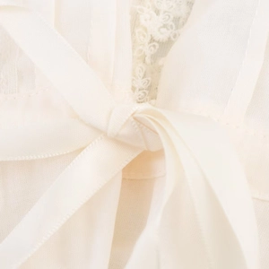 Summer lace-up camisole top with floral embroidery details and elegant ribbon closure