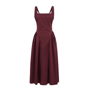 Detail of burgundy midi dress featuring a square neckline and basque waist design