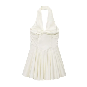 Elegant white halter neck backless dress with a front bow and pleated A-line silhouette