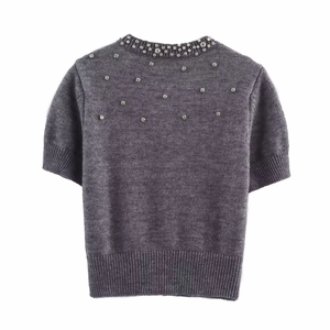 Short sleeve gray knit top with rhinestone collar detail and ribbed hem for women