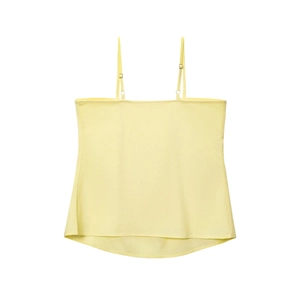 Detail of light yellow camisole with adjustable straps and textured fabric finish