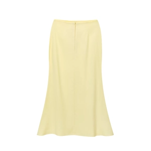 Detail of light yellow satin midi skirt with elegant high waist and invisible zipper