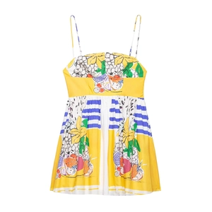 Detailed pattern showing vibrant fruit prints and blue stripes on yellow mini dress