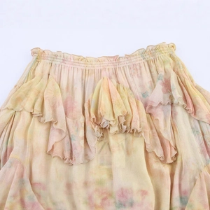 Floral pleated skirt with layered ruffles and elastic waist in soft spring colors