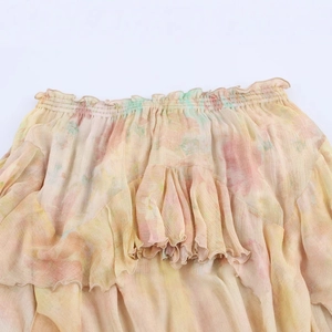 Bohemian floral print tiered mini skirt with elastic smocked waist and ruffles