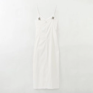 Detail view of a white spaghetti strap midi dress featuring a seamless back zipper closure