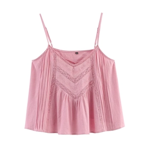 Close-up of pink cotton camisole with detailed floral embroidery and lace trim