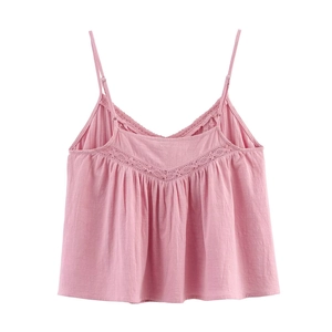 Close-up of pink cami top with lace detailing and soft pleated texture fabric