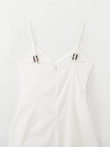 Close-up of white camisole midi dress with leopard print ring details and back zipper