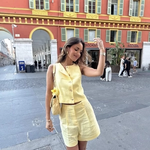 Women sleeveless yellow vest and high-waist shorts set in breathable linen fabric