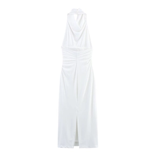 Detail of elegant white halter neck dress with draped cowl neckline and middle slit hem