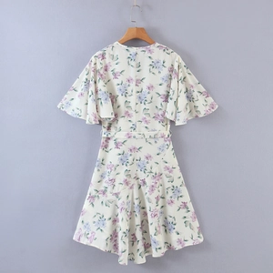 Summer V-neck floral dress with ruffle sleeves and waist tie on a white chiffon fabric