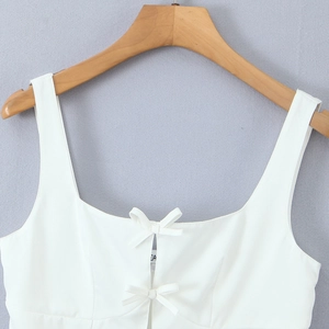 Elegant white square neck sleeveless top with delicate double bow details on front