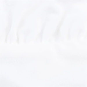 Detailed macro view of pure white fabric texture with delicate pleats and soft finish