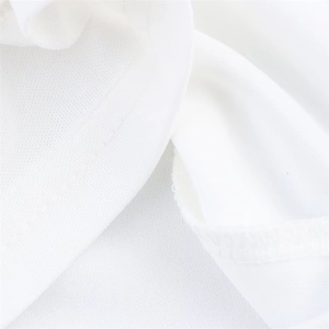 Macro view of white knitted mesh fabric texture with neat overlock stitching details