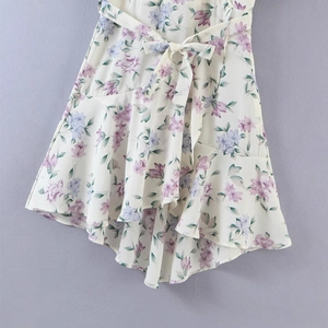 Women's V-neck floral summer dress with ruffle hem and waist bow tie in beige and lilac