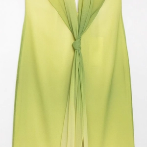 Lime green V-neck summer dress featuring delicate knot front detail and lightweight fabric