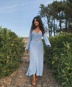 Close-up of sky blue crochet maxi dress featuring geometric hollow out floral patterns
