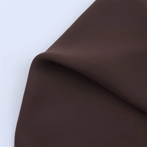 Macro detail of the dark brown textile fabric texture and premium weaving structure