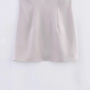 Elegant light gray rhinestone bustier mini dress featuring a structured A-line hemline