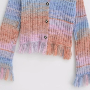 Slim fit gradient striped knit cardigan with button-down front and long fringe trim